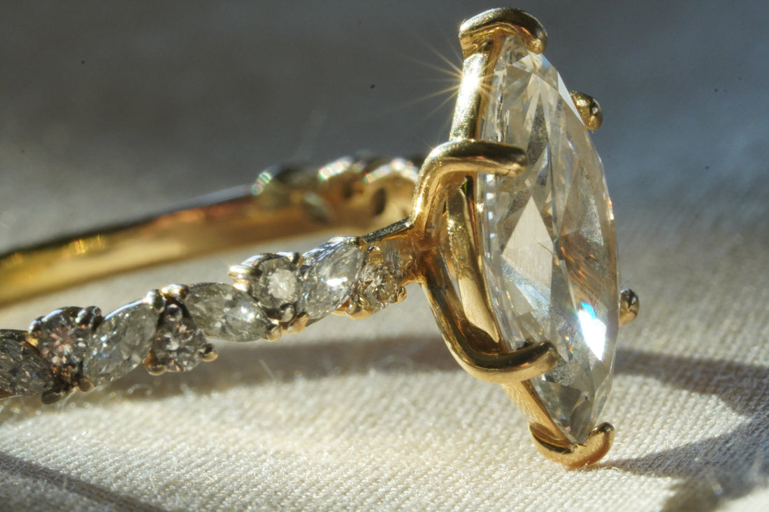 A side-by-side comparison of a natural and lab-grown diamond for custom engagement rings in Fort Worth.